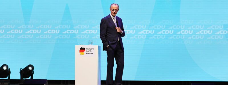 Merz zeigt sich siegessicher bei CDU-Wahlkampf in Oberhausen.  - Foto: Rolf Vennenbernd/dpa