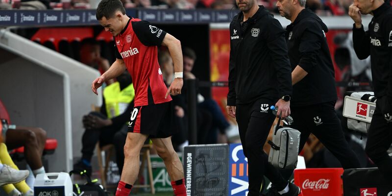 Droht in der Champions League gegen Bayern München mit einer Fußverletzung auszufallen: Florian Wirtz. - Foto: Federico Gambarini/dpa