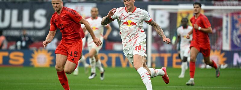 Harry Kane (l) und Kapitän Kimmich freuen sich über den Punkt in Leipzig - Foto: Elisa Schu/dpa