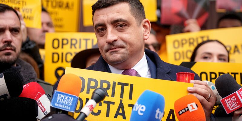 Der EU-skeptische, rechtspopulistische Präsidentenkandidat George Simion gab zusammen mit seiner Frau Ilinca seine Stimme bei der Endrunde der Präsidentenwahl ab. - Foto: Andreea Alexandru/AP/dpa