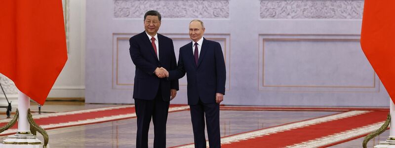 Zufriedene Gesichter bei Xi und Putin. - Foto: Evgenia Novozhenina/Pool Reurers/AP/dpa