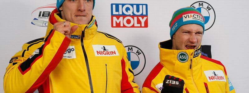 Thorsten Margis (l) will nun Olympia-Gold mit Team Johannes Lochner und fährt dann gegen seinen eisntigen Pilotne Francesco Friedrich. - Foto: Jeff Swinger/AP/dpa
