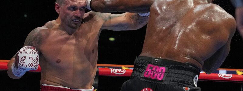Usyk (l.) gewann den Kampf in der fünften Runde durch K.-o. - Foto: Frank Augstein/AP/dpa
