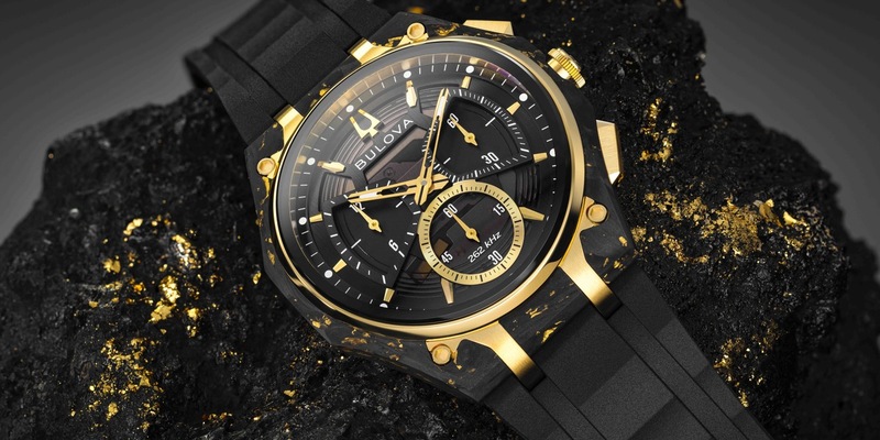 Extravagant: Goldflocken in gewölbtem Carbon / BULOVA CURV 150th Anniversary Special Edition - Foto: presseportal.de