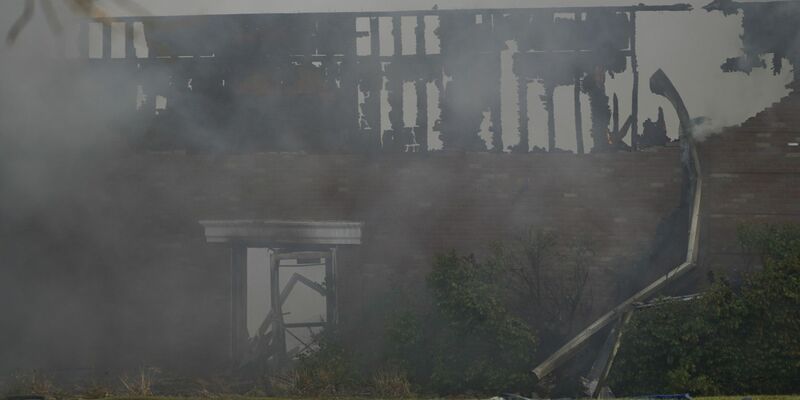 Bei Schüssen und dem Feuer sind Menschen gestorben. - Foto: Lukas Katilius | MLive.com/The Flint Journal/AP/dpa