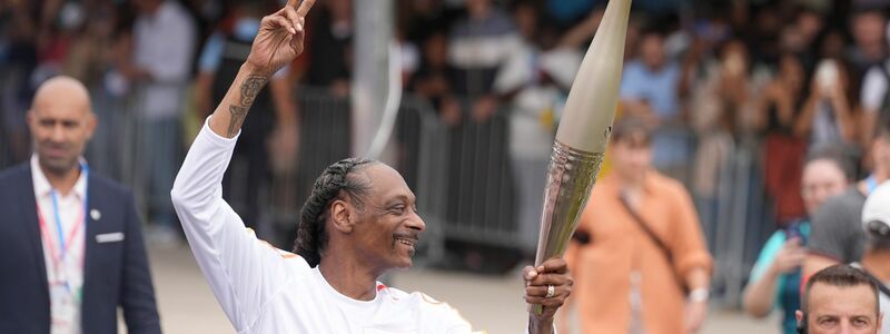 Auch  beim Fackellauf in Paris war Snoop Dogg - Foto: Marcus Brandt/dpa