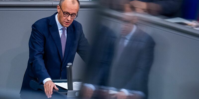 Merz zeigt sich zuversichtlich für die Abstimmung am Freitag. - Foto: Michael Kappeler/dpa