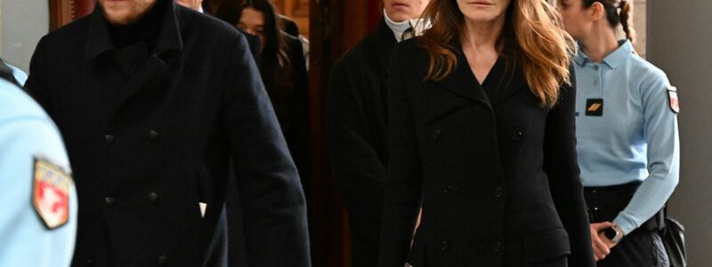 Ehefrau Carla Bruni hatte Sarkozy Sandwiches ins Gefängnis gebracht und kam zu Gerichtsentscheid über seine Freilassung. - Foto: Emma Da Silva/AP/dpa