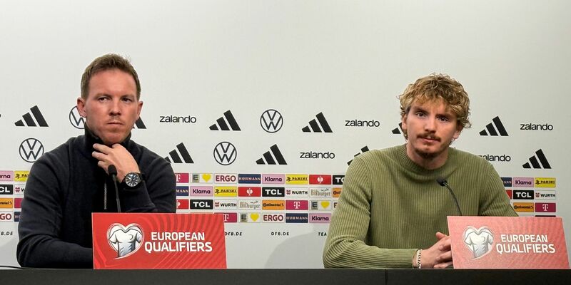 Bundestrainer Nagelsmann (l.) setzt auch auf Nick Woltemade (r.).  - Foto: Arne Richter/dpa