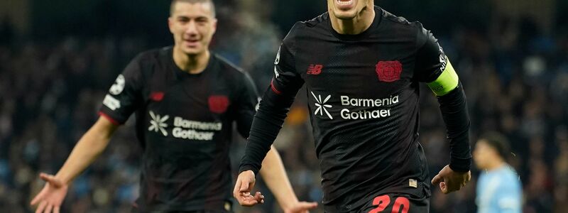 Leverkusens Alejandro Grimaldo jubelt nach seinem Führungstreffer.  - Foto: Dave Thompson/AP/dpa