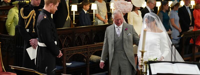 Zum Altar wurde Meghan von Charles geführt. (Archivbild) - Foto: Jonathan Brady/PA Wire/dpa