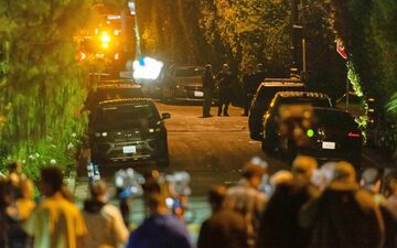 Die Polizei hat den Einsatzort abgesperrt.  - Foto: Ethan Swope/AP/dpa