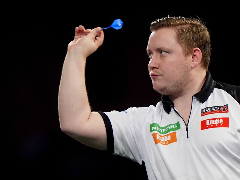 Souverän zum Start: Deutschlands bester Darts-Profi Martin Schindler gewinnt Runde eins bei der WM. - Foto: Bradley Collyer/PA Wire/dpa