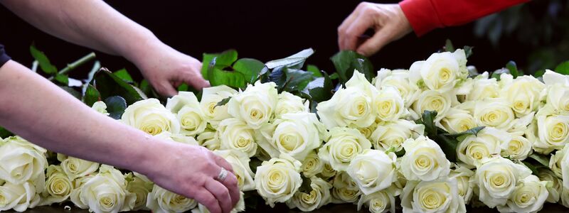 Nationaler Trauertag nach dem Brand in der Silvesternacht. - Foto: Pierre Albouy/REUTERS POOL KEYSTONE/dpa
