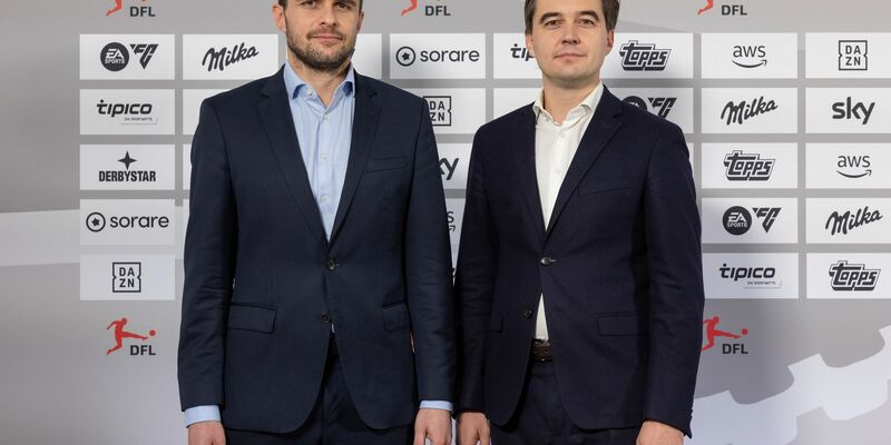Marc Lenz (l.) und Steffen Merkel: Rekordzahlen beim Wirtschaftsreport der DFL. - Foto: Jürgen Kessler/dpa