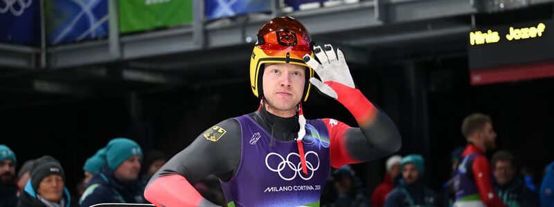 Max Langenhan liegt zur Halbzeit der Rodelrennen af Goldkurs - und das trotz einem steifen Hals. - Foto: Robert Michael/dpa