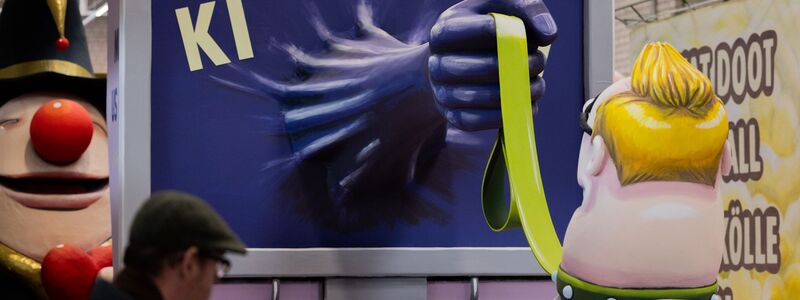 Auch die Gefahren durch KI werden im Kölner Rosenmontagszug thematisiert.  - Foto: Rolf Vennenbernd/dpa