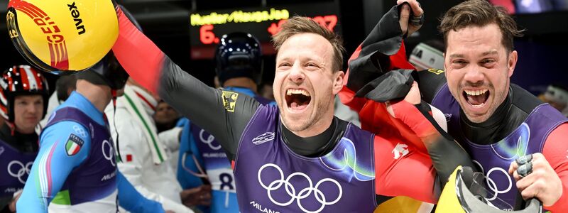 Freuen sich über Platz drei: Tobias Wendl und Tobias Arlt - Foto: Robert Michael/dpa