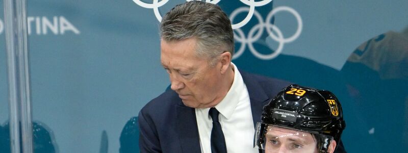 Lange Gesichter bei Bundestrainer Harold Kreis und Kapitän Leon Draisaitl - Foto: Peter Kneffel/dpa