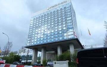 Die Verhandlungen finden in einem Genfer Hotel statt.  - Foto: Ma Ruxuan/XinHua/dpa