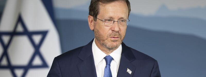 Israels Präsident Herzog hofft auf einen Machtwechsel im Iran.  - Foto: Peter Klaunzer/Keystone/dpa