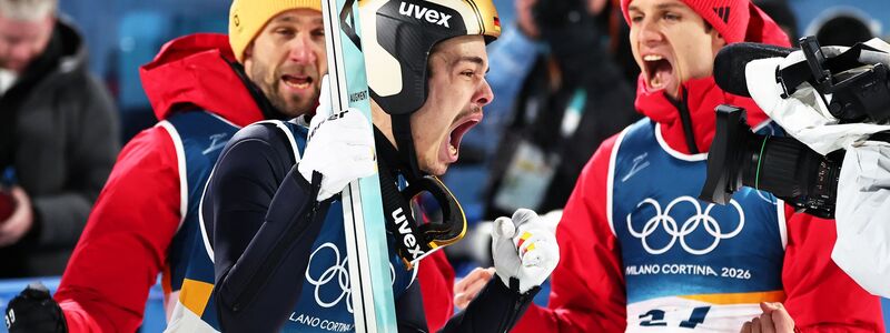 Gold-Coup: Skispringer Philipp Raimund schreit seine Freude über den Olympiasieg heraus. (Archivbild) - Foto: Daniel Karmann/dpa