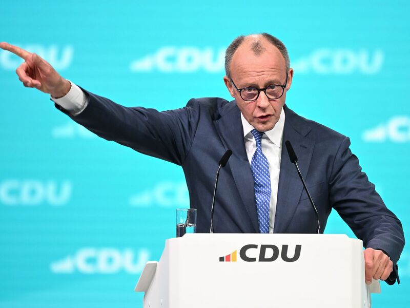 Merz wendet sich in seiner Parteitagsrede auch den Koalitionspartner SPD. - Foto: Katharina Kausche/dpa