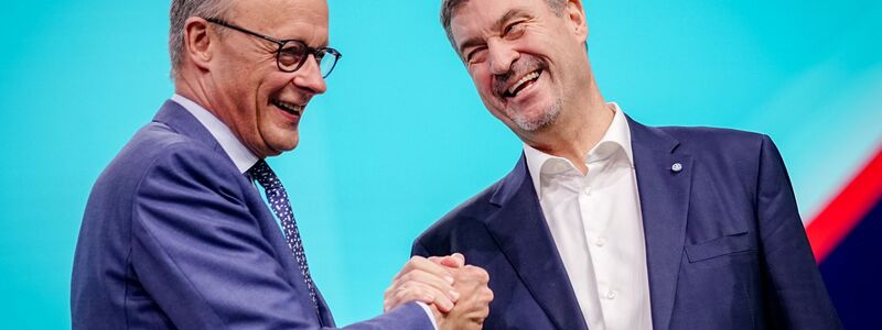 Zwischen diese beiden passt beim CDU-Parteitag kein Blatt. - Foto: Kay Nietfeld/dpa