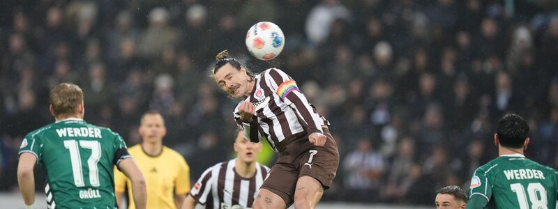 St. Paulis Kapitän Jackson Irvine beim Kopfball. - Foto: Marcus Brandt/dpa