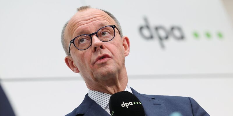 Merz will persönlich mit Trump über die Zölle sprechen.  - Foto: Christian Charisius/dpa