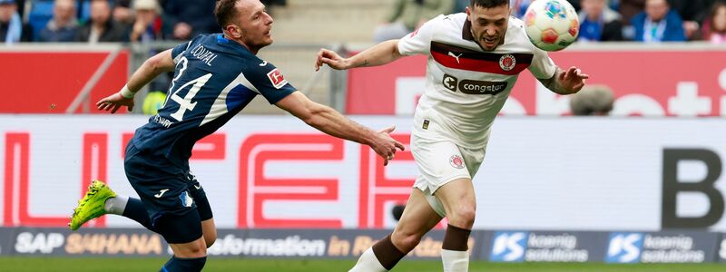 Mathias Pereira Lage köpft zum 1:0 für St. Pauli ein. - Foto: Heiko Becker/dpa