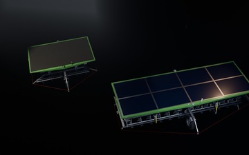 FarmDroidFD20andnewrobotside-by-side.jpg