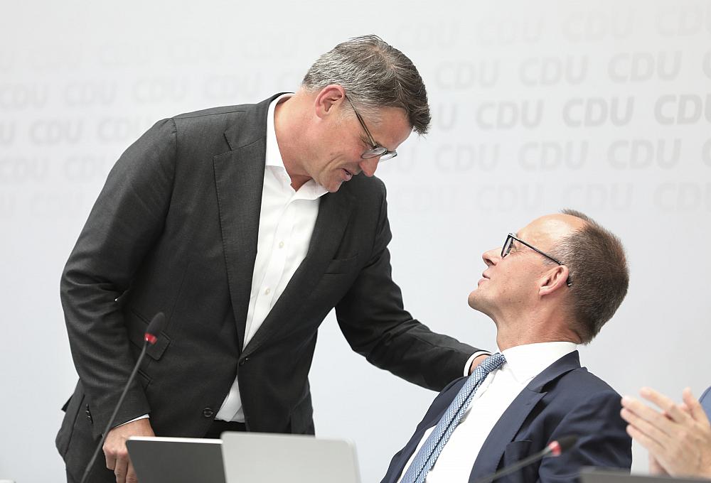 Boris Rhein und Friedrich Merz (Archiv)