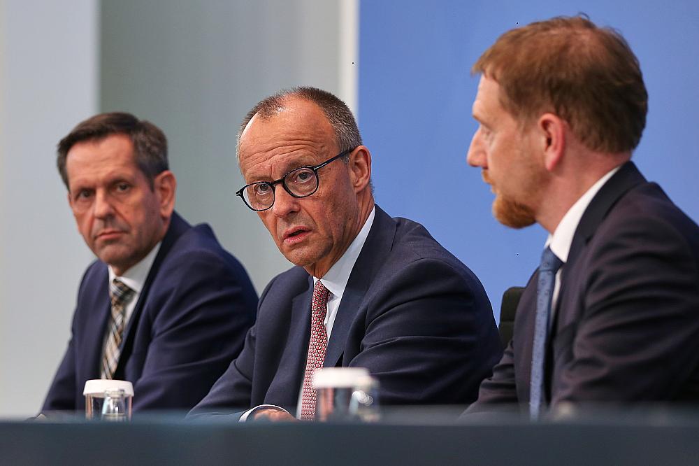 Olaf Lies, Friedrich Merz und Michael Kretschmer am 18.06.2025