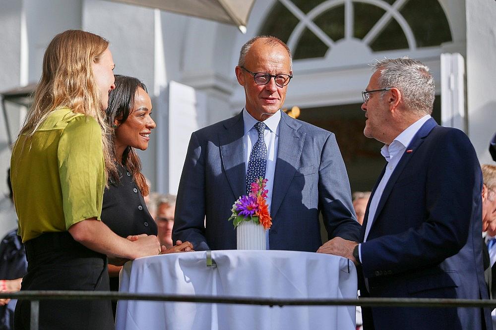 Ruth Bosse, Judith Dada, Friedrich Merz und Jörg Dittrich am 26.08.2026