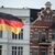Eine deutsche Flagge weht im Berliner Bezirk Alt-Moabit. - Foto: Lisa Ducret/dpa