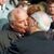 Der sowjetische Staats- und Parteichef Michail Gorbatschow (l) wird nach seiner Ankunft zu den Feierlichkeiten zum 40jährigen Staatsjubiläum der  DDR am 6. Oktober 1989 in Ost-Berlin von dem Staatsratsvorsitzenden Erich Honecker mit dem traditionellen Bruderkuss willkommen geheißen. - Foto: Wolfgang Kumm/dpa