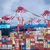 Containerschiffe liegen in Wilhelmshaven. - Foto: Sina Schuldt/dpa