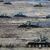 Fahrende Panzer während der Militärübungen «Union Courage-2022» zwischen Russland und Belarus auf einem Feld des Truppenübungsplatzes Obuz-Lesnovski. - Foto: Alexander Zemlianichenko Jr/AP/dpa