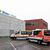 Einsatzfahrzeuge des Deutschen Roten Kreuz DRK und der Malteser stehen vor dem Gebäude der Freiburger Messe. Das dort eingerichtete Lazarett dient als Puffer für die überforderten Kliniken. - Foto: Philipp von Ditfurth/dpa