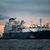 Das Spezialschiff «Höegh Esperanza» in Wilhelmshaven. Es dient als Plattform, um Flüssigerdgas (LNG) anzulanden und zu regasifizieren. - Foto: Sina Schuldt/dpa