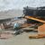 Das Wrack des gekenterten Bootes an eiem Strand bei Cutro. Bei dem Bootsunglück sind mehrere Menschen ums Leben gekommen. - Foto: Giuseppe Pipita/AP/dpa