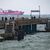 Am Verladekran im Hafen von Mukran  haben Kletterer ein Banner mit der Aufschrift «Gas zerstört» befestigt. Greenpeace kritisiert, die Pipeline solle durch mehrere Meeresschutzgebiete verlaufen. - Foto: Stefan Sauer/dpa