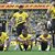 Spieler von Borussia Dortmund sitzen nach dem Spiel enttäuscht auf dem Platz. - Foto: Bernd Thissen/dpa