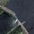 Dieses von Maxar Technologies über AP zur Verfügung gestellte Satellitenbild zeigt den zerstörten Kachowka-Staudamm. - Foto: Uncredited/Maxar Technologies/AP/dpa