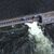 Dieses von Maxar Technologies über AP zur Verfügung gestellte Satellitenbild zeigt den Kachowka-Staudamm. - Foto: Uncredited/Maxar Technologies/AP/dpa