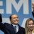 Silvio Berlusconi, damaliger Forza-Italia-Chef, und Giorgia Meloni, die Vorsitzende der rechtsextremen Partei Fratelli d'Italia (Brüder Italiens), bei einer Wahlkampfveranstaltung. - Foto: Oliver Weiken/dpa