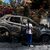 Ein Mädchen steht in Turmus Aya im Westjordanland neben einem Auto, das infolge eines Brandanschlags durch jüdische Siedler zerstört worden ist. - Foto: Ilia Yefimovich/dpa