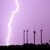 Ein Blitz entlädt sich während eines Gewitters hinter dem Fernmeldeturm Telemax. - Foto: Julian Stratenschulte/dpa