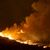 Nahe der Ortschaft Vati im Süden der Insel Rhodos steht ein Wald in Flammen. - Foto: Christoph Reichwein/dpa